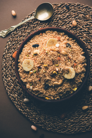 Semolina Halwa / Sooji ka Halva or sweet Rava Sheera or shira - Indian festival sweet made of semolina, nuts and Gheeの写真素材