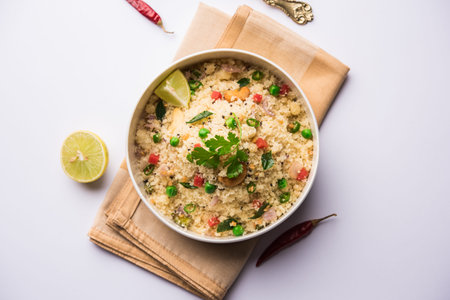 Rava Upma / Uppuma - south indian breakfast served in a bowl. selective focus