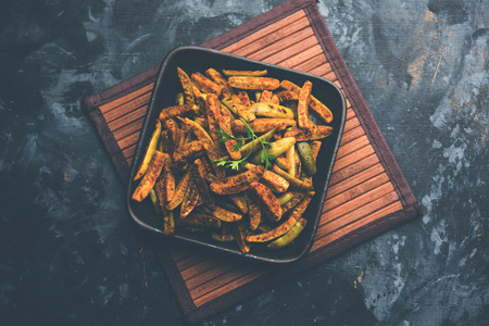 Tindora Sabzi / Tendli / tondli Fry also known as Ivy Gourd fry recipe. selective focusの写真素材