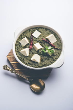 Palak Paneer Curry made up of spinach and cottage cheese served in a bowl. selective focusの写真素材