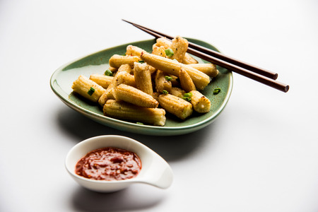 Baby Corn Manchurian dry - popular Indo-chinese starter recipe. selective focusの写真素材