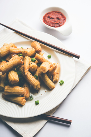 Baby Corn Manchurian dry - popular Indo-chinese starter recipe. selective focusの写真素材