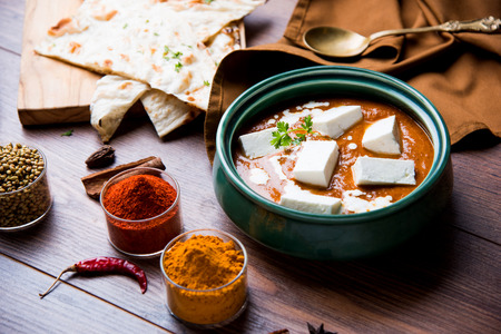 Paneer Butter Masala is a popular North Indian recipe for lunch/dinner made using cottage cheese in red tomato curry. usually served with Rice and chapati/naan. selective focusの写真素材