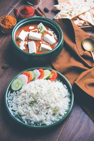 Paneer Butter Masala is a popular North Indian recipe for lunch/dinner made using cottage cheese in red tomato curry. usually served with Rice and chapati/naan. selective focusの写真素材
