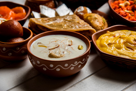 group of Indian Sweet / mithai in terracotta bowlの写真素材