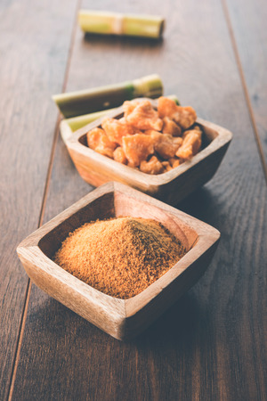 Organic Gur or Jggery Powder is unrefined sugar obtained from concentrated sugarcane juice. served in a bowl. selective focusの写真素材
