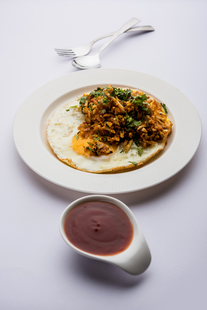 Anda or Egg ghotala is a popular innovative tasty recipe from Surat, Gujaratの写真素材