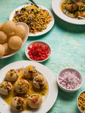 Group of Bombay chat food includes golgappa/panipuri, bhel-puri, sev-poori, dahipuri, Ragda pattice, raj kachori etc. Selective focusの写真素材