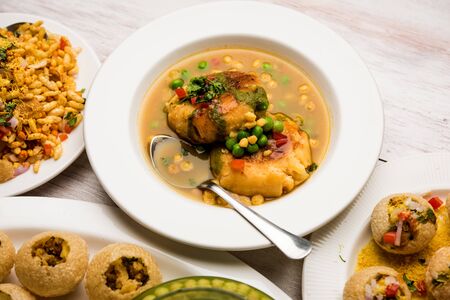 Group of Bombay chat food includes golgappa/panipuri, bhel-puri, sev-poori, dahipuri, Ragda pattice, raj kachori etc. Selective focusの写真素材