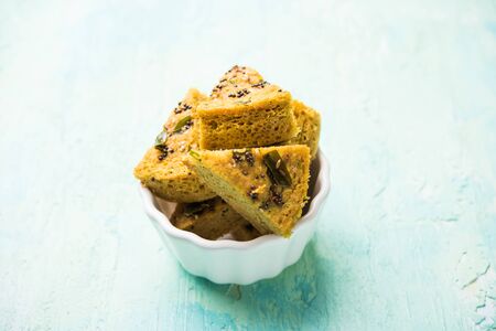 Handvo / handwa is a vegetable cake originating from the Gujarat, India. selective focusの写真素材