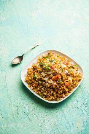 Bhelpuri Chaat/chat is a road side tasty food from India, served in a bowl or plate. selective focusの写真素材