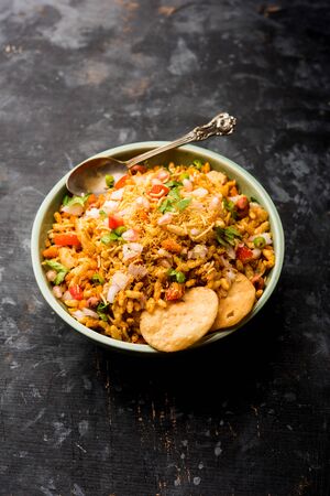 Bhelpuri Chaat/chat is a road side tasty food from India, served in a bowl or plate. selective focusの写真素材