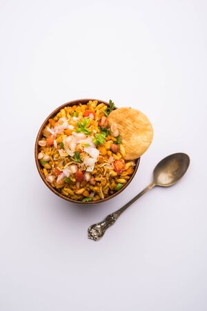 Bhelpuri Chaat/chat is a road side tasty food from India, served in a bowl or plate. selective focusの写真素材