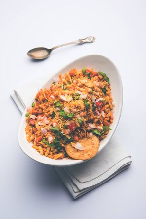 Bhelpuri Chaat/chat is a road side tasty food from India, served in a bowl or plate. selective focusの写真素材