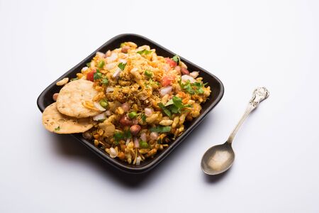 Bhelpuri Chaat/chat is a road side tasty food from India, served in a bowl or plate. selective focusの写真素材