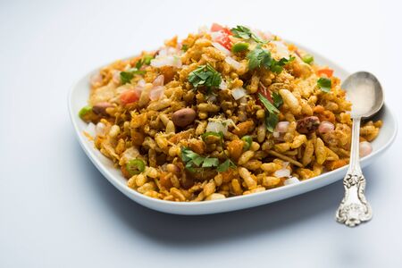 Bhelpuri Chaat/chat is a road side tasty food from India, served in a bowl or plate. selective focusの写真素材