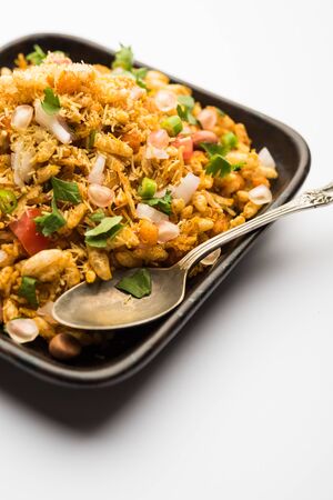Bhelpuri Chaat/chat is a road side tasty food from India, served in a bowl or plate. selective focusの写真素材