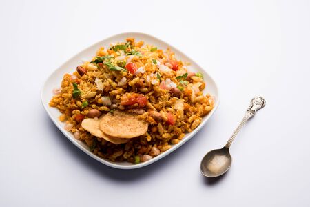 Bhelpuri Chaat/chat is a road side tasty food from India, served in a bowl or plate. selective focusの写真素材
