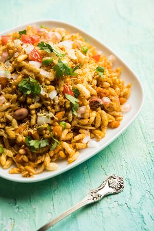 Bhelpuri Chaat/chat is a road side tasty food from India, served in a bowl or plate. selective focusの写真素材