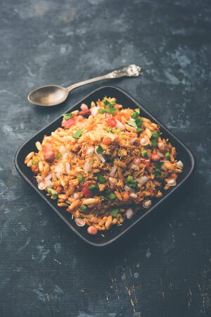 Bhelpuri Chaat/chat is a road side tasty food from India, served in a bowl or plate. selective focusの写真素材