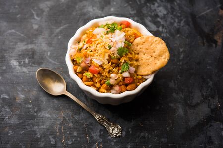 Bhelpuri Chaat/chat is a road side tasty food from India, served in a bowl or plate. selective focusの写真素材