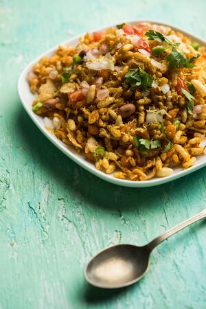 Bhelpuri Chaat/chat is a road side tasty food from India, served in a bowl or plate. selective focusの写真素材