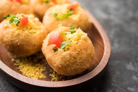 Sev puri - Indian snack and a type of chaat. Popular in Mumbai/pune from Maharashtra. it's a roadside food also served as a starter in restaurantsの写真素材