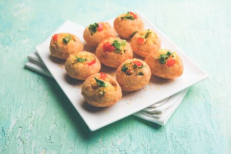 Sev puri - Indian snack and a type of chaat. Popular in Mumbai/pune from Maharashtra. it's a roadside food also served as a starter in restaurantsの写真素材