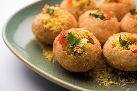 Sev puri - Indian snack and a type of chaat. Popular in Mumbai/pune from Maharashtra. it's a roadside food also served as a starter in restaurantsの写真素材