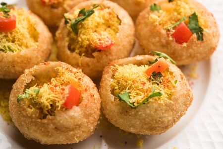 Sev puri - Indian snack and a type of chaat. Popular in Mumbai/pune from Maharashtra. it's a roadside food also served as a starter in restaurantsの写真素材