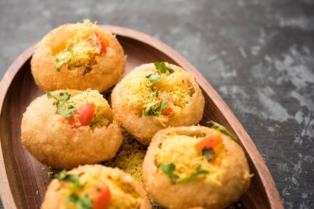 Sev puri - Indian snack and a type of chaat. Popular in Mumbai/pune from Maharashtra. it's a roadside food also served as a starter in restaurantsの写真素材