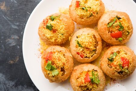 Sev puri - Indian snack and a type of chaat. Popular in Mumbai/pune from Maharashtra. it's a roadside food also served as a starter in restaurantsの写真素材