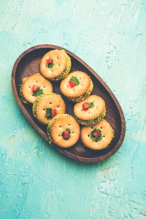 homemade salted Biscuit chat or sandwich for kids or starers for guestsの写真素材