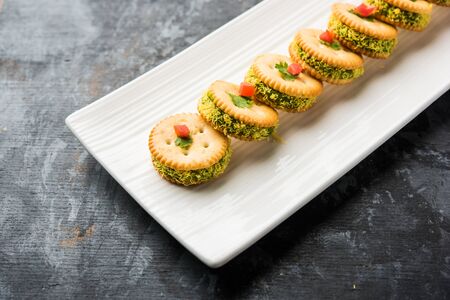 homemade salted Biscuit chat or sandwich for kids or starers for guestsの写真素材