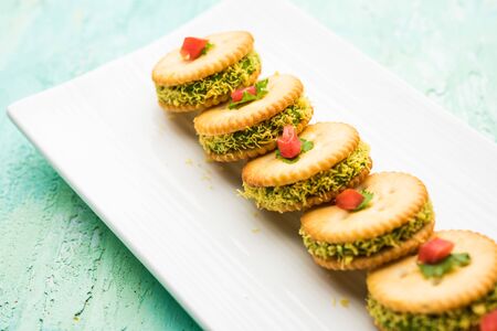 homemade salted Biscuit chat or sandwich for kids or starers for guestsの写真素材