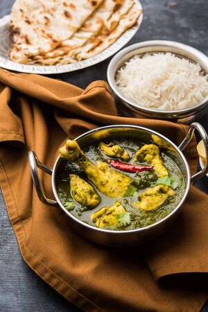 Undhiyu is a Gujarati mixed vegetable dish, specialty of Surat, India. Served in a bowl with or without pooriの写真素材