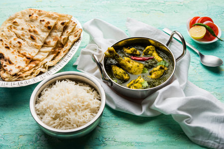 Undhiyu is a Gujarati mixed vegetable dish, specialty of Surat, India. Served in a bowl with or...