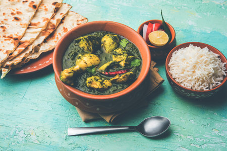 Undhiyu is a Gujarati mixed vegetable dish, specialty of Surat, India. Served in a bowl with or...