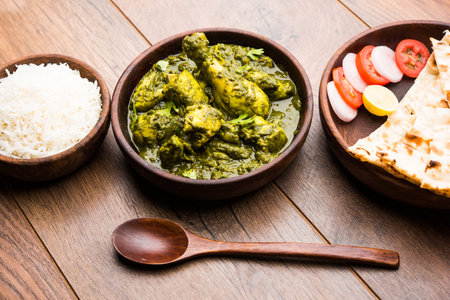 Undhiyu is a Gujarati mixed vegetable dish, specialty of Surat, India. Served in a bowl with or...