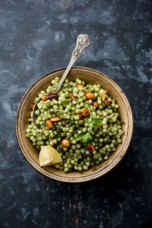 Hariyali sabudana khichdi is a delicious twist to the regular Sago khichadi made using cilantro , chillies and groundnutsの写真素材