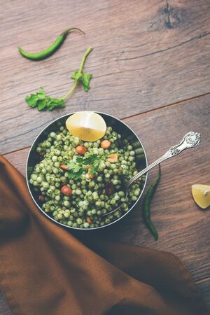 Hariyali sabudana khichdi is a delicious twist to the regular Sago khichadi made using cilantro , chillies and groundnutsの写真素材