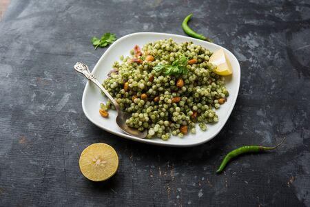 Hariyali sabudana khichdi is a delicious twist to the regular Sago khichadi made using cilantro , chillies and groundnutsの写真素材