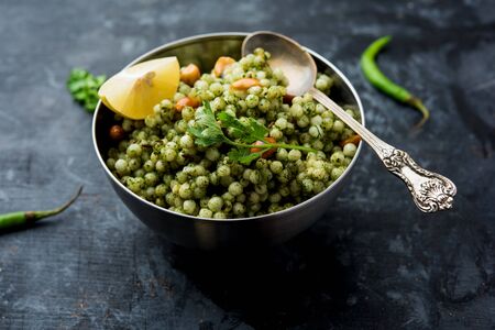 Hariyali sabudana khichdi is a delicious twist to the regular Sago khichadi made using cilantro , chillies and groundnutsの写真素材