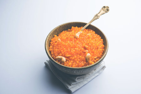 Sabudana or Sago Kesari dessert for Vrat Upvas also known as Sweetened Tapioca Pearl. served in a bowl. selective focusの写真素材