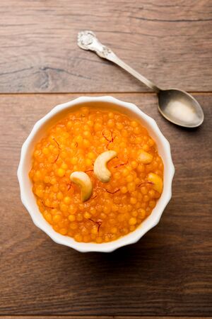 Sabudana or Sago Kesari dessert for Vrat Upvas also known as Sweetened Tapioca Pearl. served in a bowl. selective focusの写真素材