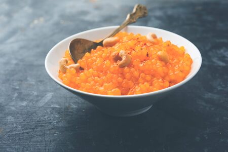 Sabudana or Sago Kesari dessert for Vrat Upvas also known as Sweetened Tapioca Pearl. served in a bowl. selective focusの写真素材
