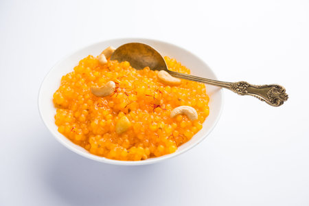 Sabudana or Sago Kesari dessert for Vrat Upvas also known as Sweetened Tapioca Pearl. served in a bowl. selective focusの写真素材