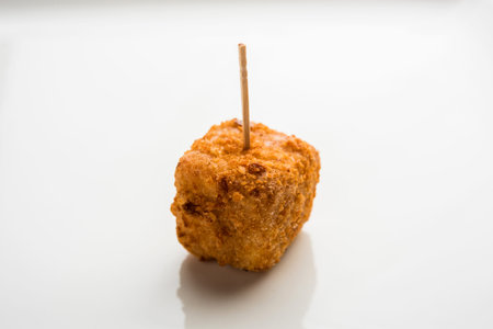 Crispy Paneer popcorn is a popular party snack and an appetiser. selective focus
