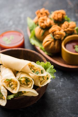 Crispy Potli Samosa or veg money bags are delicious Indian snacks of spiced aloo and mix veggies Or Meat/kheema  stuffed in flaky dough. It's a great creative starter or appetiser. served with ketchupの写真素材