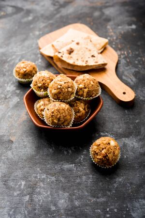 Leftover chapati Laddu / Churma Laddoo or Policha Ladu made with Roti, peanuts, dry fruits and jaggery. selective focusの写真素材